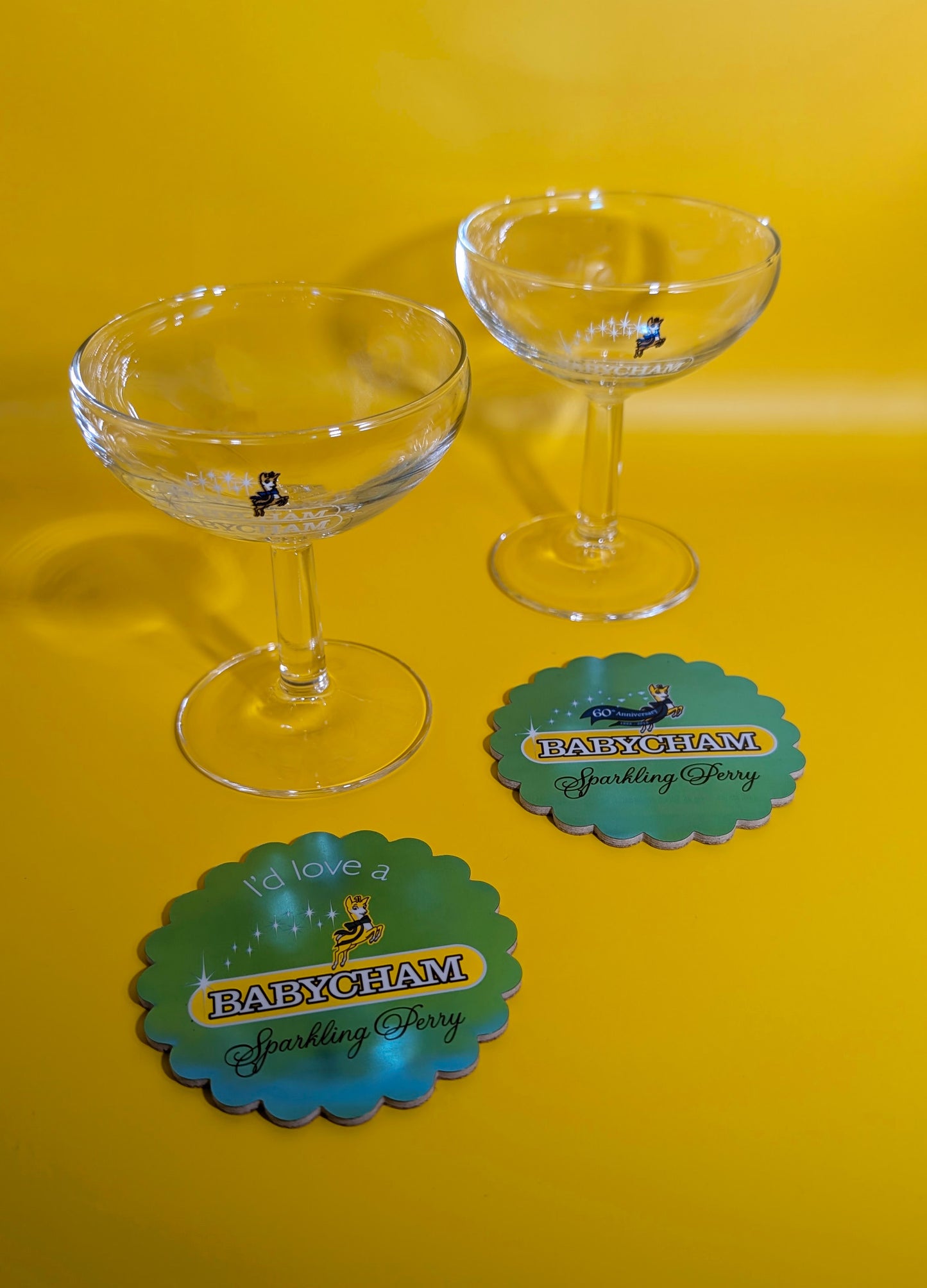 Pair of Vintage Babycham 60th Anniversary Coasters